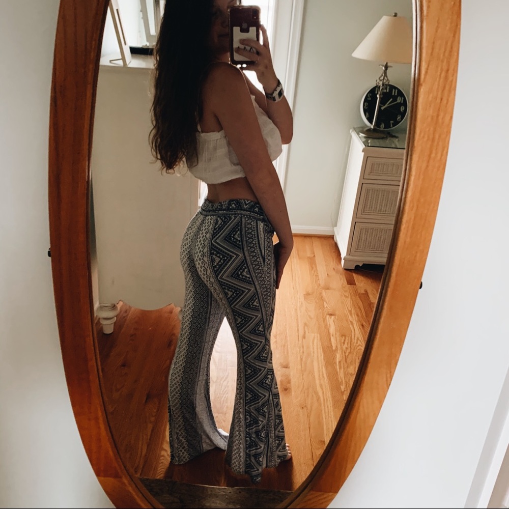 Rip curl patterned flare pants